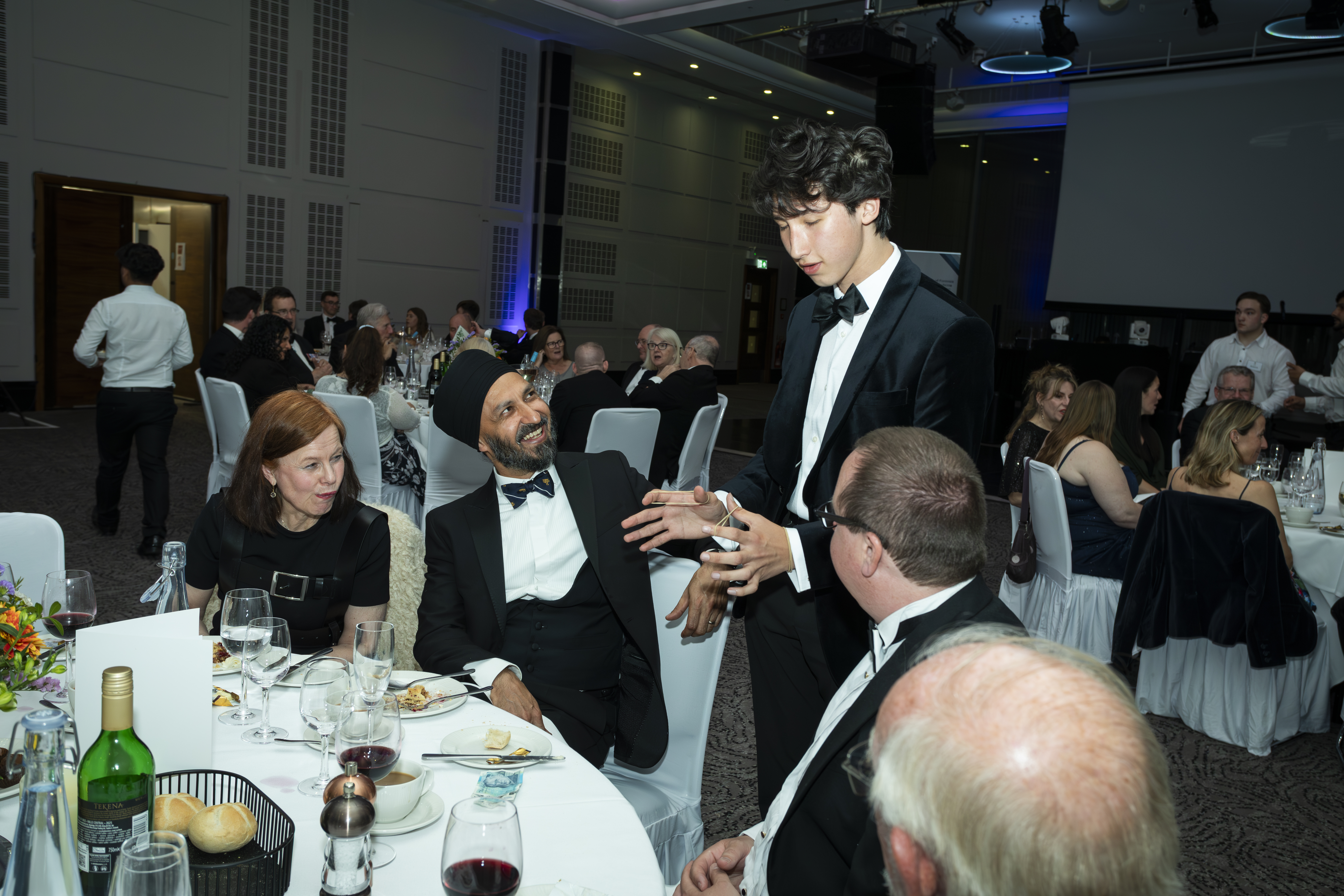 A magic trick shared between Noah and a guest